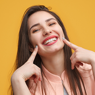 Woman with braces smiling