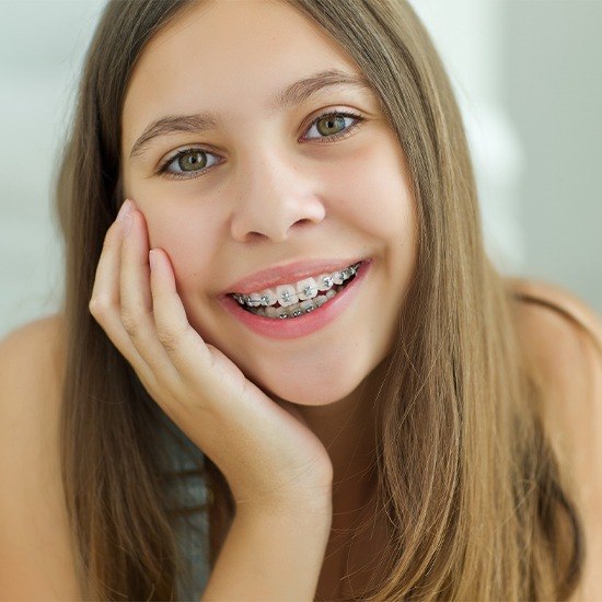 Teen girl with self ligating braces