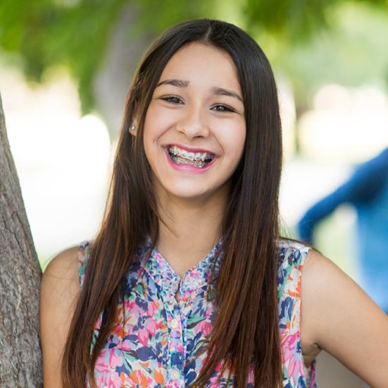 Smiling teen girl with braces