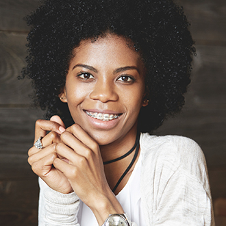 Teen girl with braces smiling